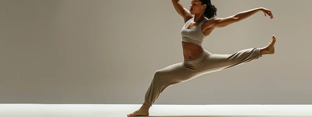 a woman gracefully performing a pilates pose in form-fitting, breathable yoga pants, showcasing flexibility and strength.