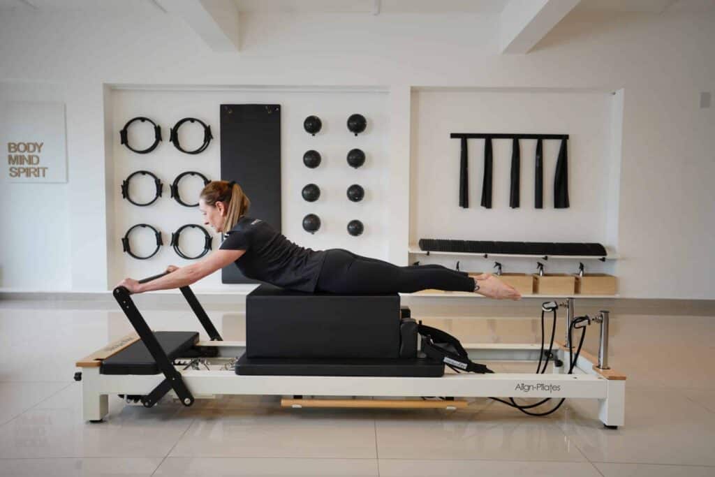 learn pilates studio equipment reformer guide